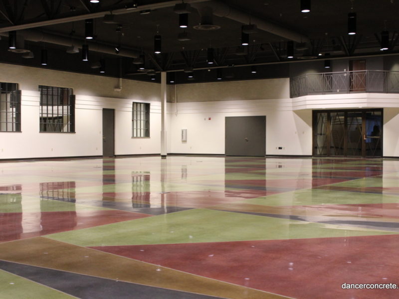 polished concrete floor in automobile museum