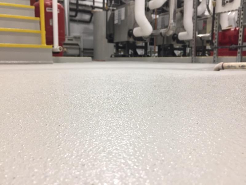 100% epoxy floor in a concrete gray color
