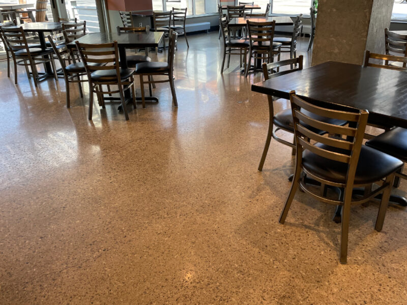 Restaurant dining room with polished concrete