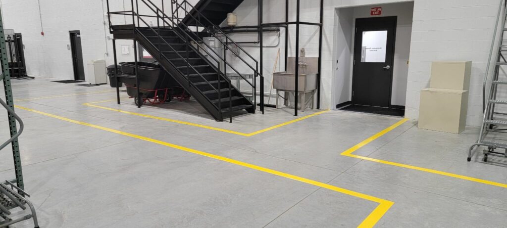 Lane Stripping Warehouse Floor by Dancer Concrete Design of For