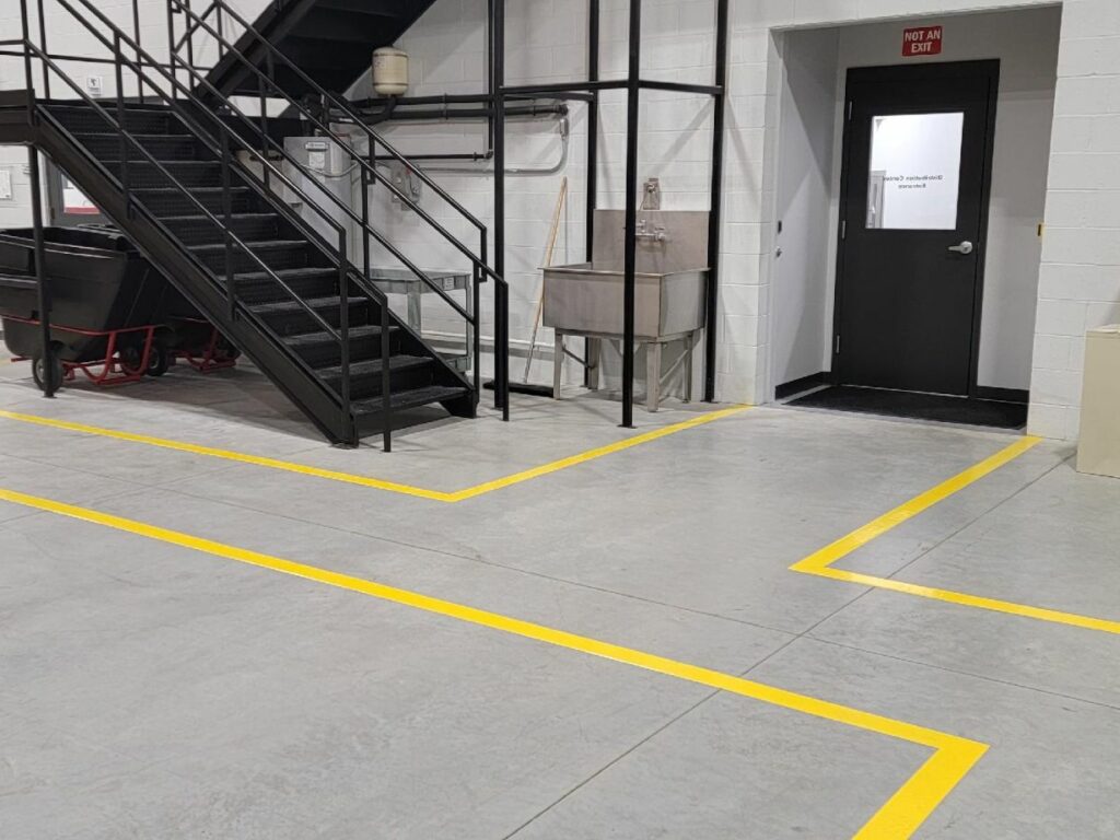 Lane Stripping Warehouse Floor by Dancer Concrete Design of For
